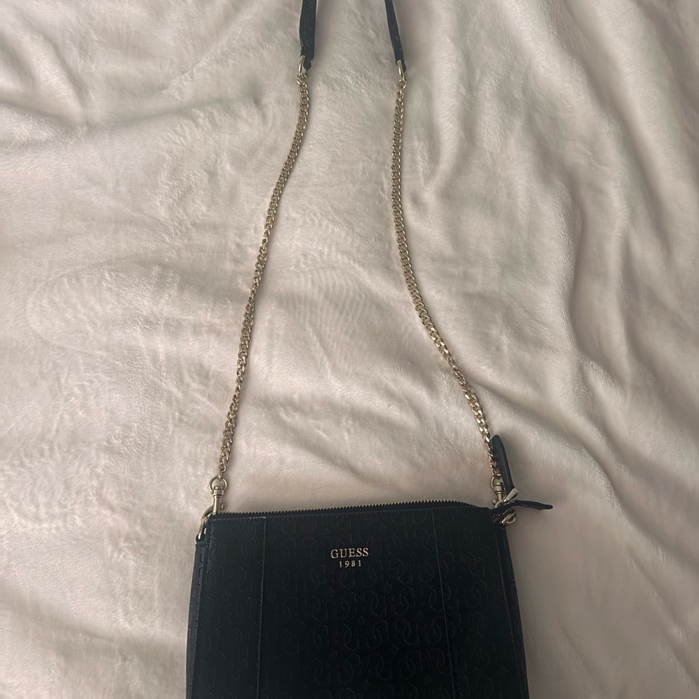 Guess Black and Gold Crossbody Bag with Elegant Design